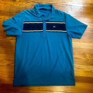 Large Travis Matthew blue polo with stripe accent